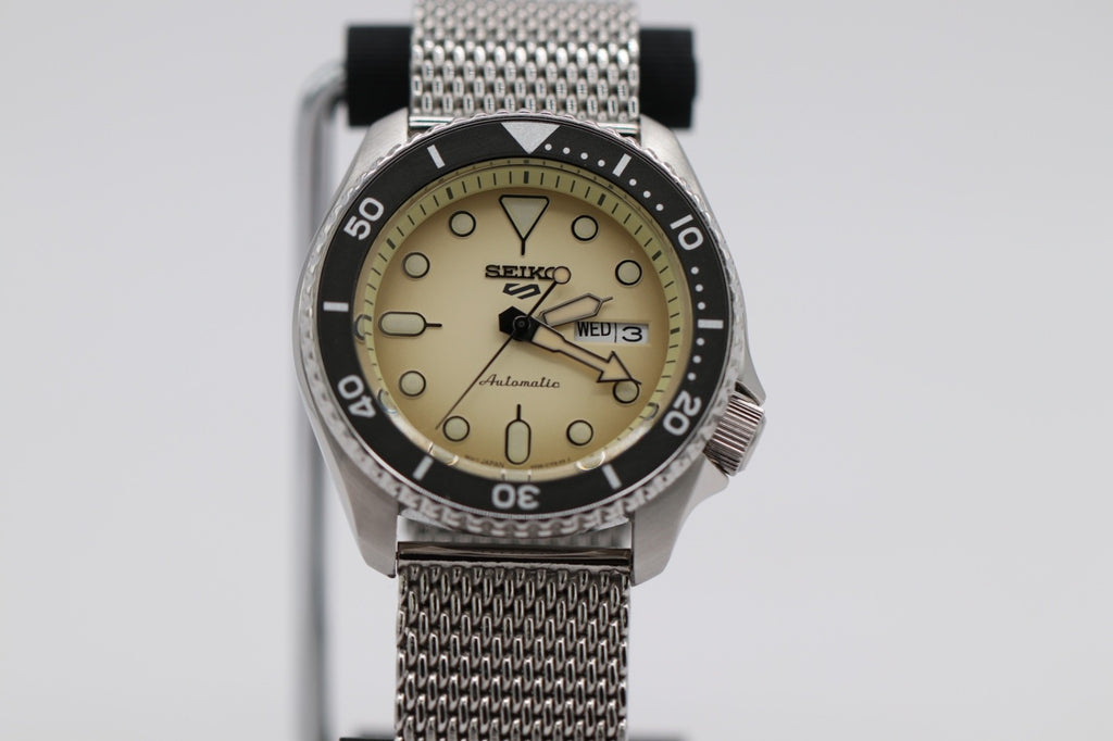 Seiko 5 Sports Men's Watch SRPD67 Automatic Cream Dial Day Date Steel 42mm