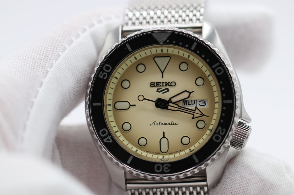 Seiko 5 Sports Men's Watch SRPD67 Automatic Cream Dial Day Date Steel 42mm